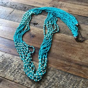 Turquoise and gold long beaded necklace